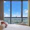Luxury 50th Floor 2BR at Queens Wharf with Parking