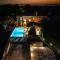 Villa Nika - Rustic Stone House with Heated Pool