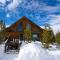 Miles Behind Log Cabin