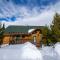 Miles Behind Log Cabin
