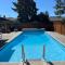 Bright poolside walkout two bedroom basement suite in the Okanagan
