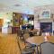 Cobblestone Inn & Suites - Denison | Majestic Hills - Denison