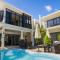 Villa Alizée Boutique Hotel - Idéal Couples & Pros - Rooftop - Parking privé - 10min Port-Louis