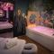 Suite Passion - Jacuzzi privé - Table massage