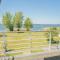 Ferienhaus Peeneblick - exklusives Traumhaus in Direktlage am Wasser mit Bootssteg und Aussensauna