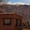 Macondo - Casas entre cerros