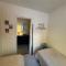 Modern waterfront rorbu with terrace and stunning sea view - free parking