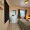 Modern waterfront rorbu with terrace and stunning sea view - free parking