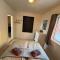 Modern waterfront rorbu with terrace and stunning sea view - free parking
