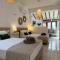 Del Sol Suites