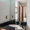 FRATELLI CORP APART HOTEL