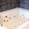 Wellness Suite mit Whirlpool und Sauna Wellness Suite mit Whirlpool und Sauna