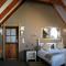 TNiqua Stable Inn