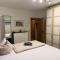 Ferienwohnung Happiness Schlafzimmer 2026 renoviert mit neuem Boxspringbett