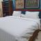 Ruma Kaca Simanindo Bed&Breakfast