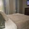 Old Fort Loft King & Queen suites nearest accomodation to Marshals Museum power your EV for free!