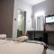 Foto: Central Guest Rooms 13/56
