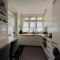Sfeervol appartement met tuin bij centrum en station Sfeervol appartement met tuin bij centrum en station