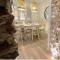 Apartamento con encanto de piedra ideal parejas hasta 6 personas en L Ampolla Arrels Terra