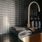 Green Rooms Braddon - Designer Micro Apartments