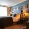 The Potters Heron - A Heartwood Inn
