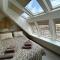 "ZeeLandZon" Holiday home by the lake with Jacuzzi and Sauna