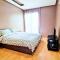 Prestigia 2BR Apartment - Balcony with Pool View - City Center