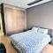 Prestigia 2BR Apartment - Balcony with Pool View - City Center