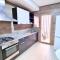 Prestigia 2BR Apartment - Balcony with Pool View - City Center