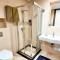 Prestigia 2BR Apartment - Balcony with Pool View - City Center