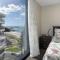 Oceanside Apartment with Iconic Views
