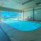 Tradewinds 204-Beachfront-Low Density-Seasonal Heated Pool-Steps to the Beach