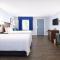 Quarters Inn & Suites