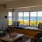 Seafront house with a view