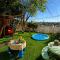 CasaViva Sky - 3BR 1BA Sleeps 10 - Rooftop City Views, Firepit & Bunk Room - Near Zoo & Beaches