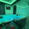 Suite cinéma et jacuzzi privé