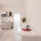 GuestHost - Porta Garibaldi White Flats