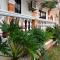 The Executive Villa Inn & Suites