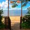 Coconut Grove Beachfront Cottages - Matei