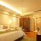 Foto: Yantai Tianma Argyle Suites Apartment 33/90