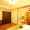 Foto: Yantai Tianma Argyle Suites Apartment 80/90