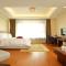 Foto: Yantai Tianma Argyle Suites Apartment 49/90