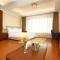 Foto: Yantai Tianma Argyle Suites Apartment 48/90