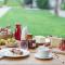 Hotel Tiefenbrunn Gardensuites & Breakfast