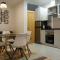 Foto: Old Town Apartment By Living Well 13/32