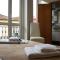 Foto: Old Town Apartment By Living Well 20/32