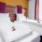 TIPTOP Hotel Burgschmiet Garni