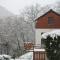 Cottage with a terrace and a view of the valley - Евай