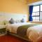 Foto: Dongguan Soho Service Apartment 29/56