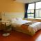 Foto: Dongguan Soho Service Apartment 4/56